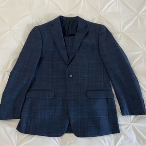 Calvin Klein X-Fit classic windowpane plaid pattern suit.